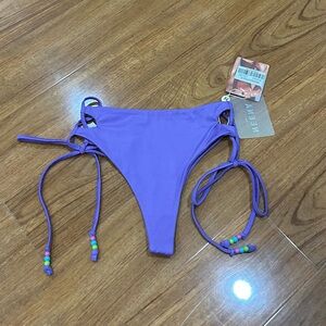 Neena purple tie up bikini bottoms NWT